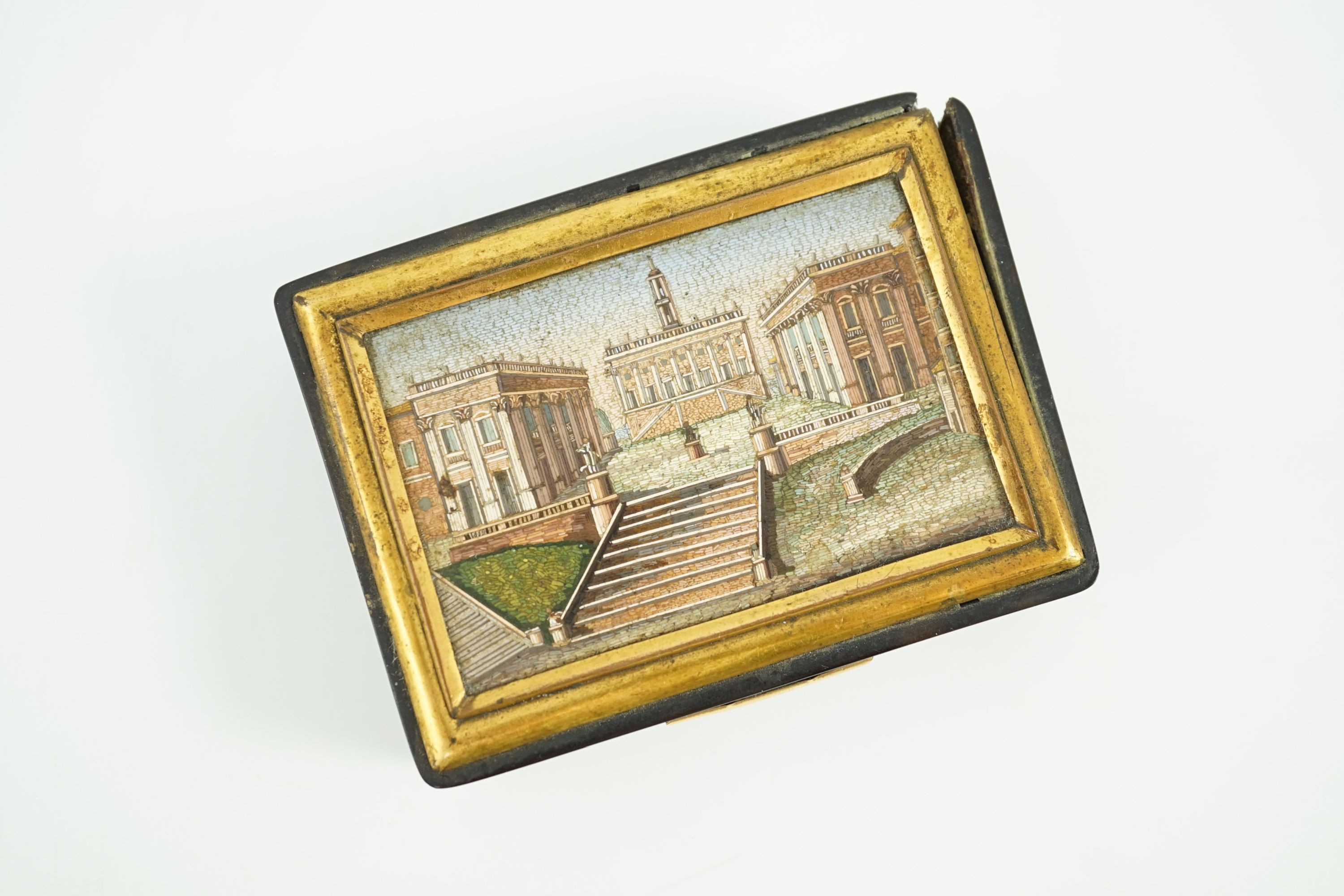 A 19th century French micro mosaic topped gold mounted tortoiseshell snuff box, 8.5 x 6.25cm, 2.5cm high